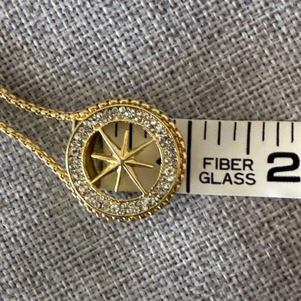 Gold Tone Compass Starburst Pendant Necklace with Crystal Halo